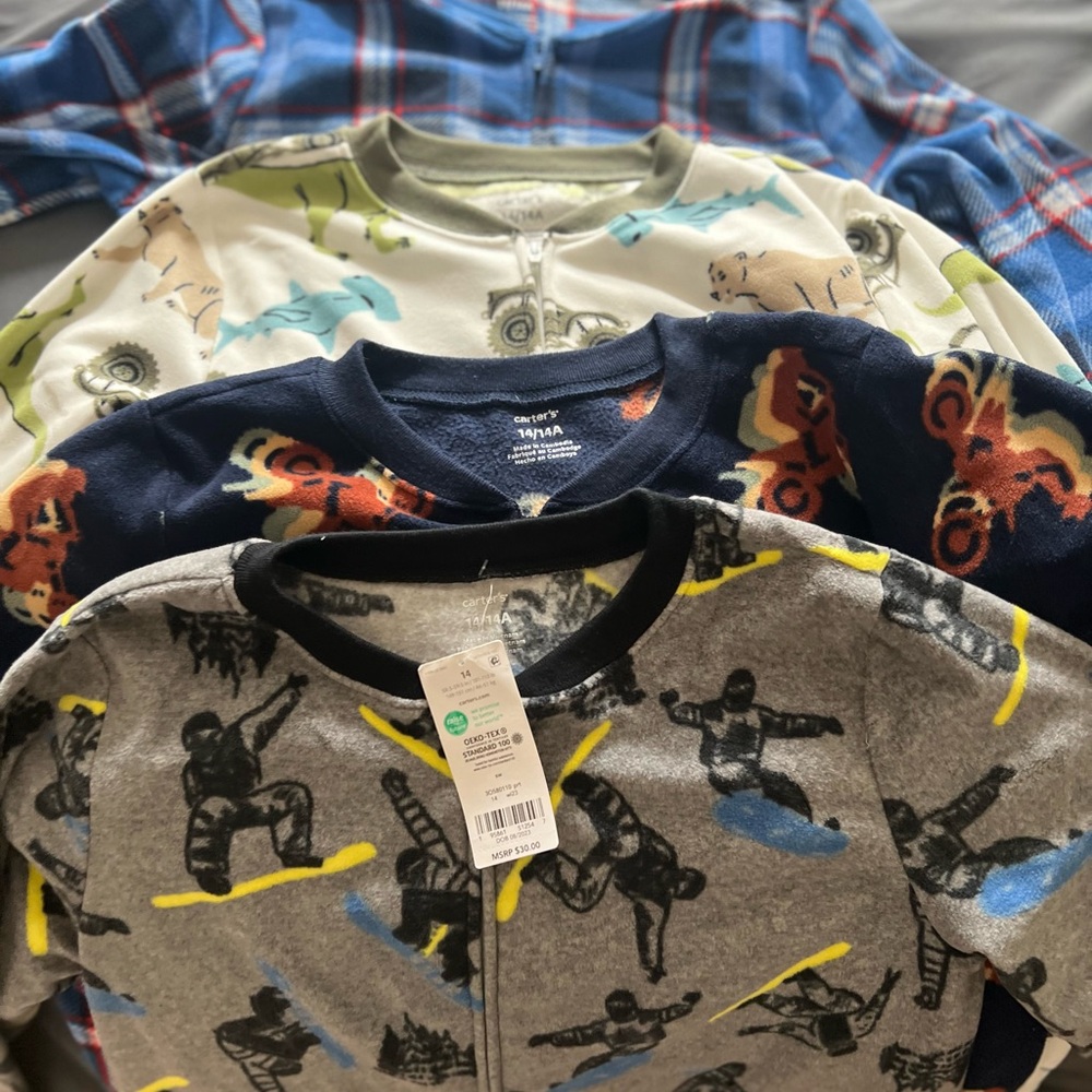 Carters pajamas 
4 pair sold together